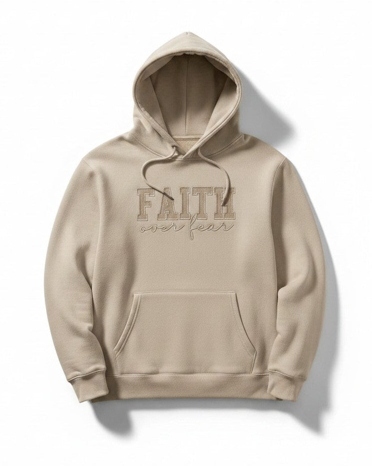 Beige hoodie with 'Faith over Fear' text on a white background